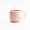 light pink mug with glossy surface