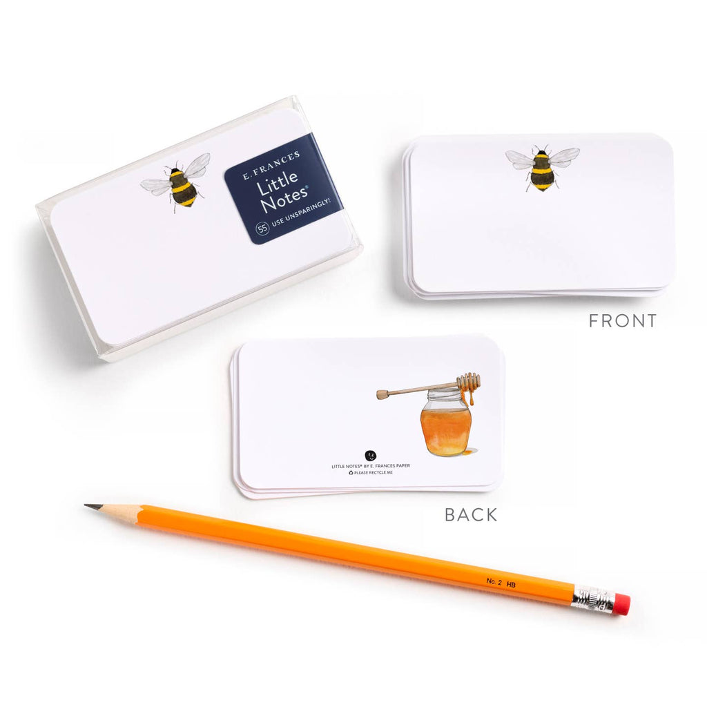 Note cards with bee and honey design, accompanied by a pencil on a white background