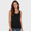Woman wearing a black tank top against a plain background