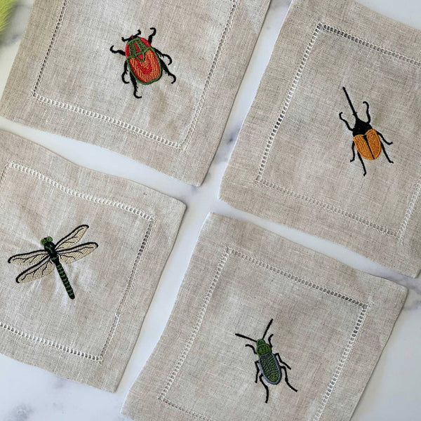 Tan Cloth Coasters made of Linen with colorful bugs embroidered on them