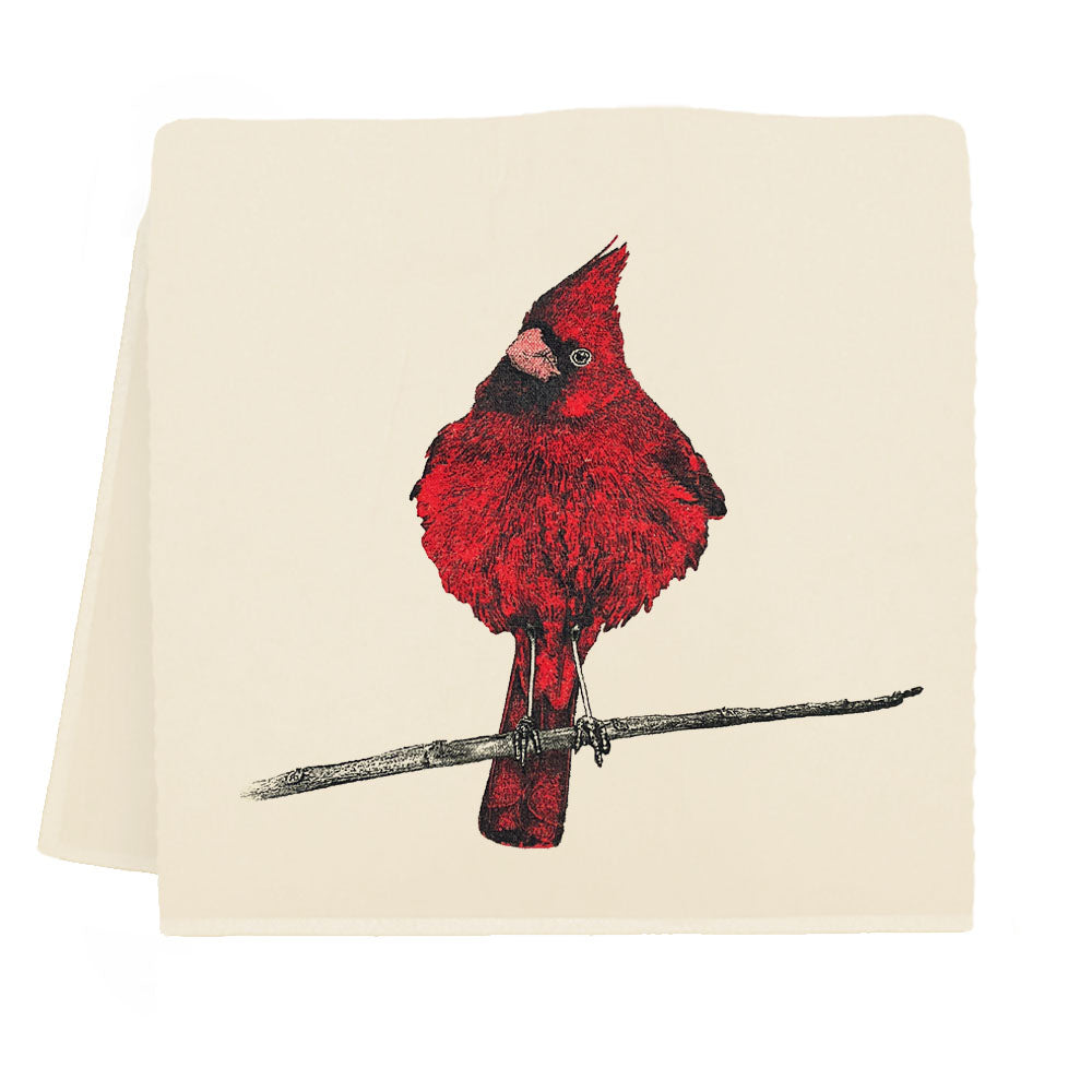 Red cardinal bird on a branch design on a folded towel with a white background