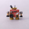 Steampunk-style jewelry set with gears and red box on a light gray background