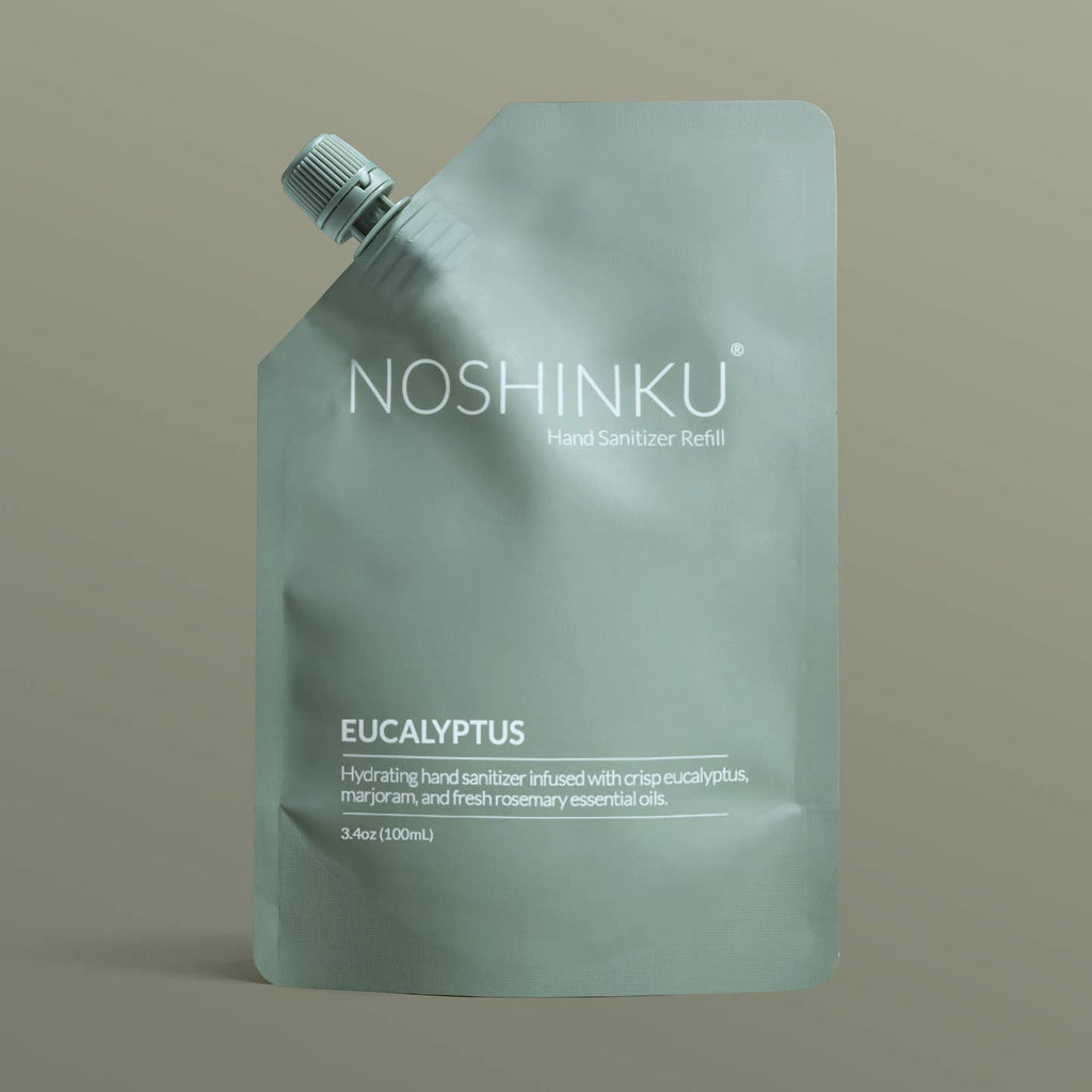 Noshinku eucalyptus hand sanitizer refill pouch on a beige background