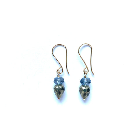Reflective faceted stone in the shape of an upside down teardrop and blue oval stone on top, beaded through gold earwire