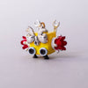 Colorful keychain with a yellow base, red accents, and silver details on a light gray background
