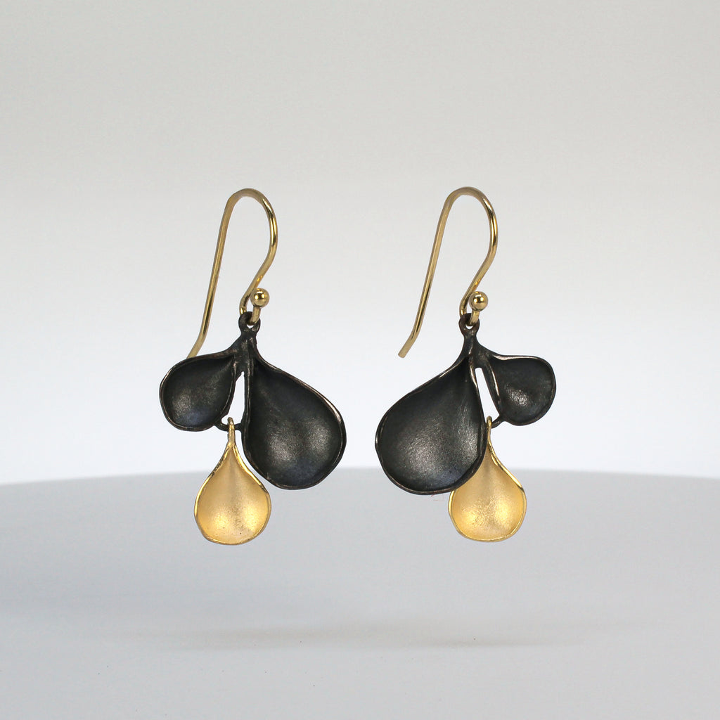 Falling petal earrings in 18k gold vermeil and oxidized sterling silver by sarah richardson