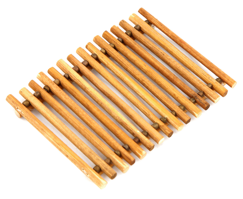 Wooden soap dish on a white background