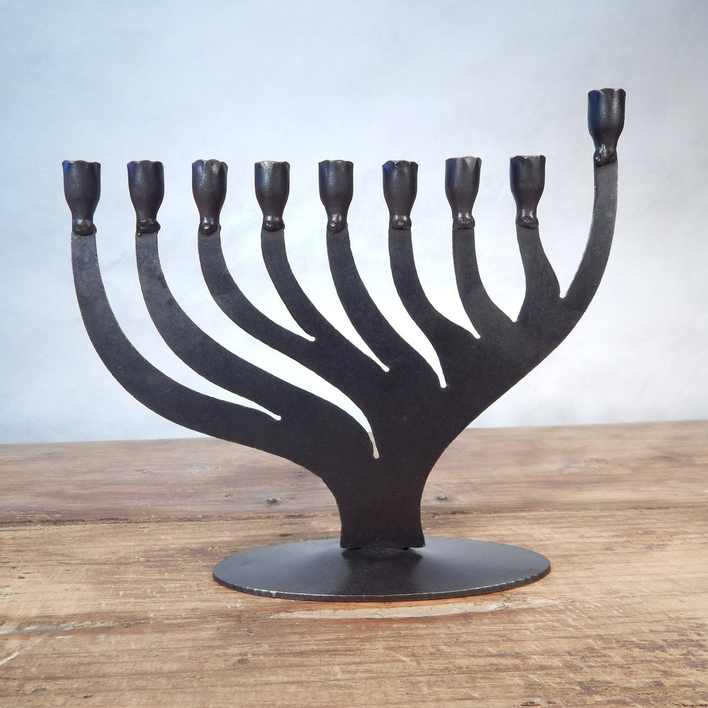 A black iron menorah