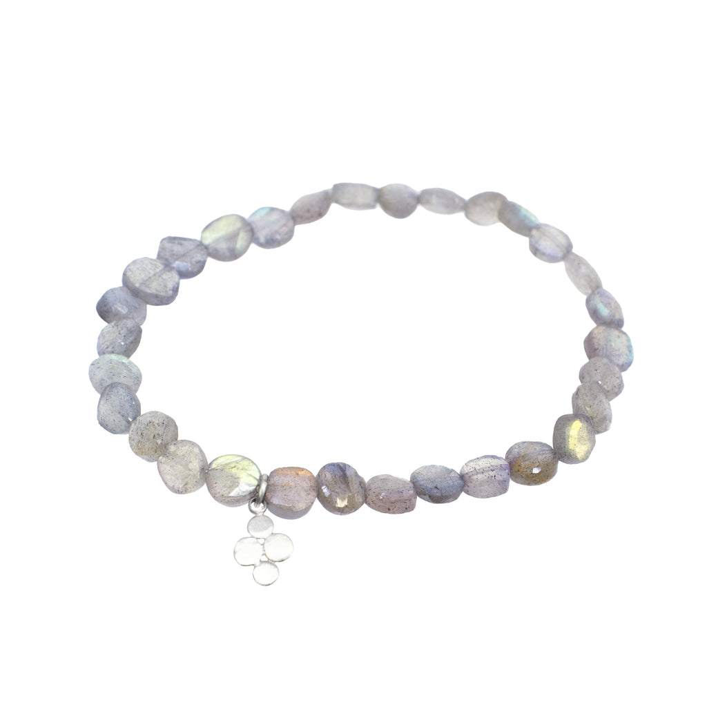 Beaded bracelet with a silver clasp on a white background