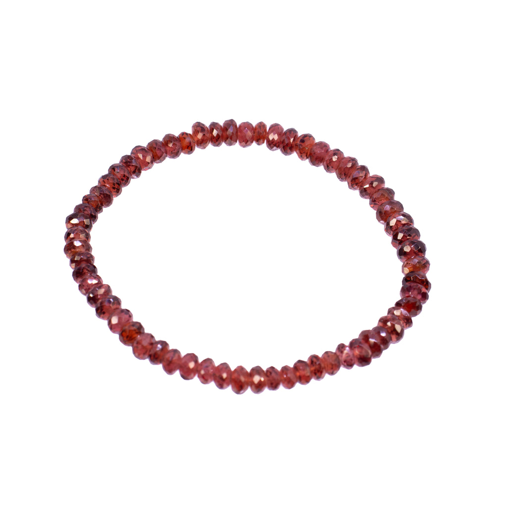 Beaded bracelet with red beads on a white background