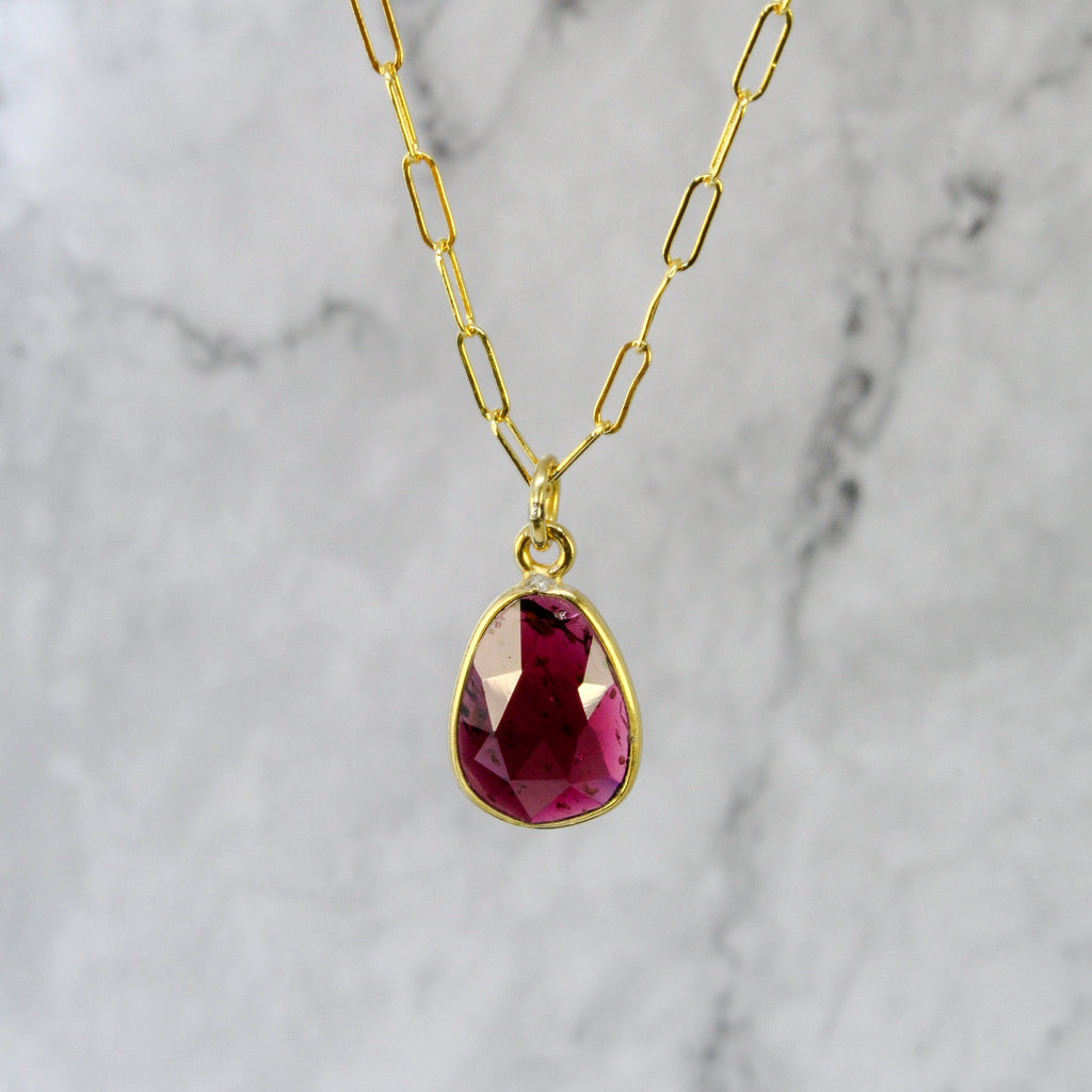 Bezeled garnet pendent in 18k gold vermeil by sarah richardson